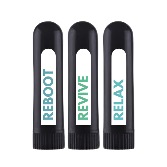 Three black nasal inhalers with different words printed on them. The first one says 'REBOOT', the second one says 'RELAX', and the third one says 'RX'.