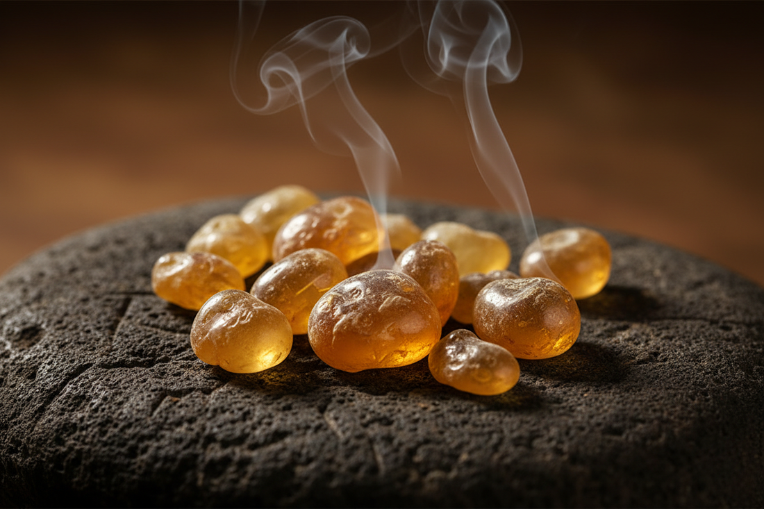 Golden frankincense resin tears with sacred smoke on ancient stone — Boswellia wellness | Prasadhak