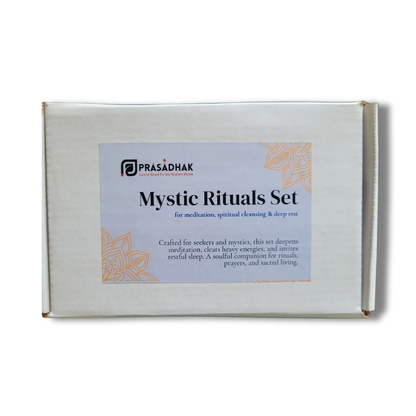 White box with pale blue label reading Mystic Rituals Set, orange floral corners, Prasadhak logo.