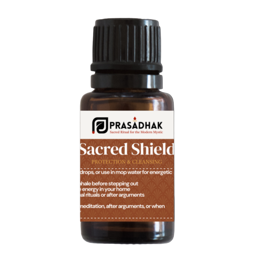 Prasadhak Sacred Shield Essential Oil Blend bottle - tea tree, eucalyptus, lemon, cedarwood
