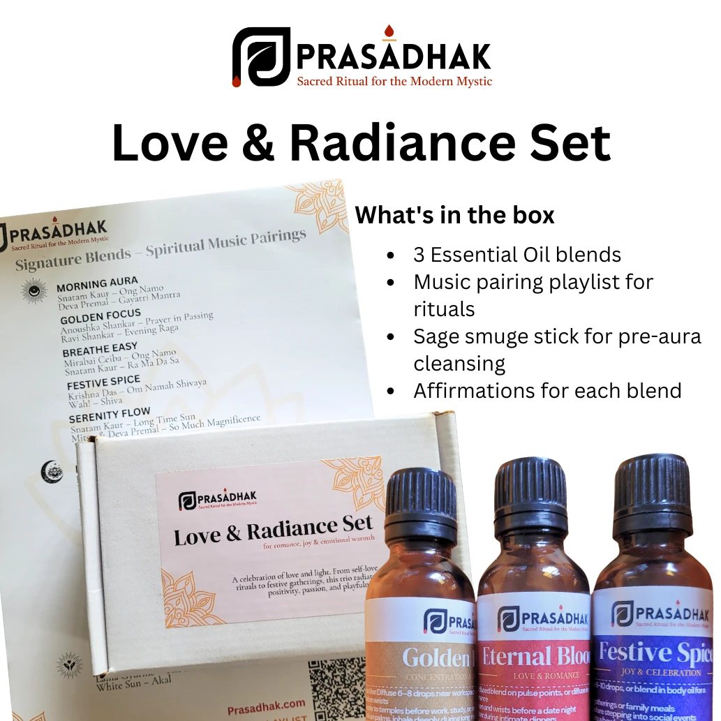 Three amber essential oil bottles with blue caps beside a white Love & Radiance Set box featuring a pink label and orange floral accents.