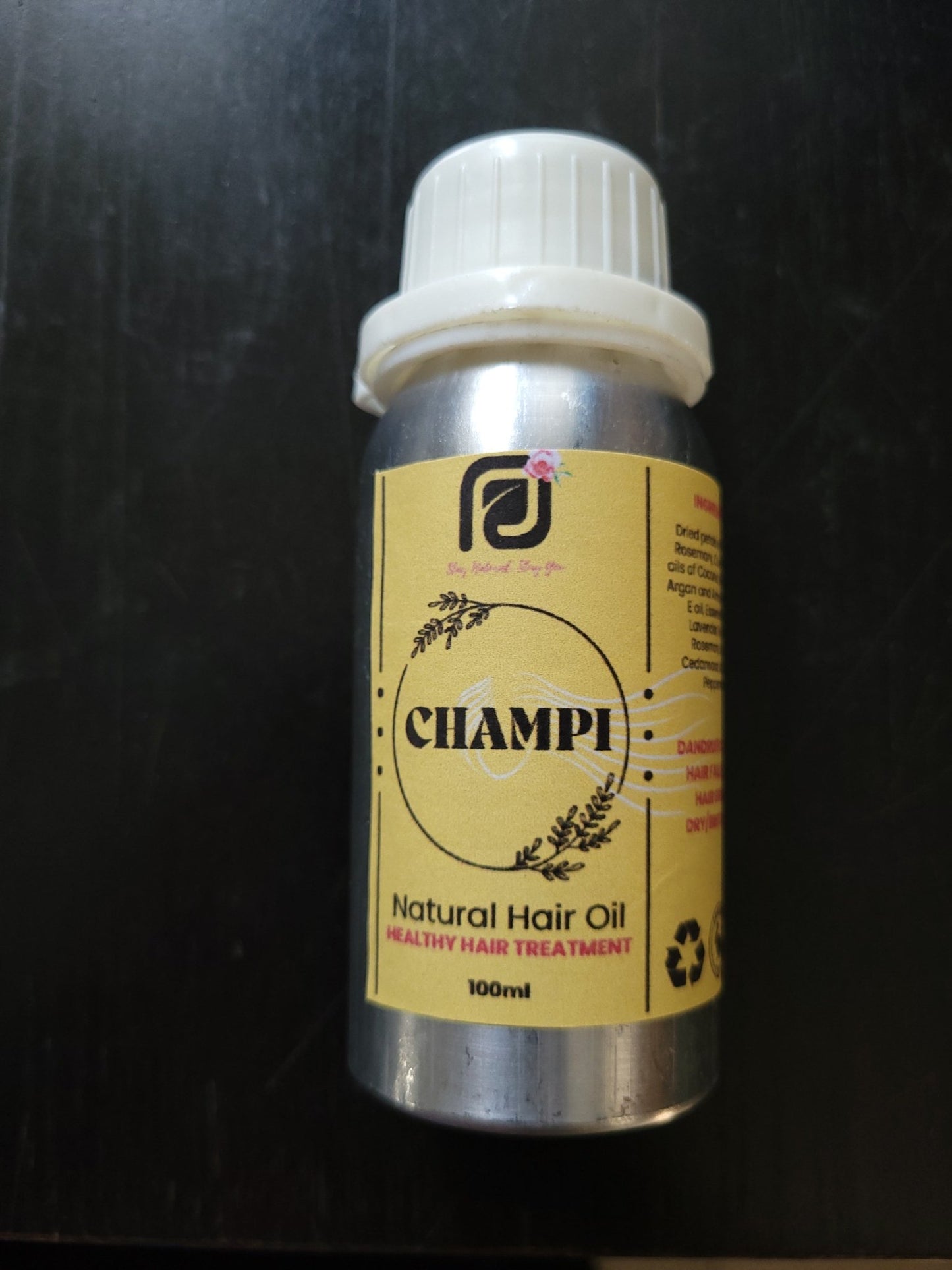Prasadhak Champi Hair Oil bottle - Ayurvedic scalp massage oil with rose, rosemary, argan, essential oils