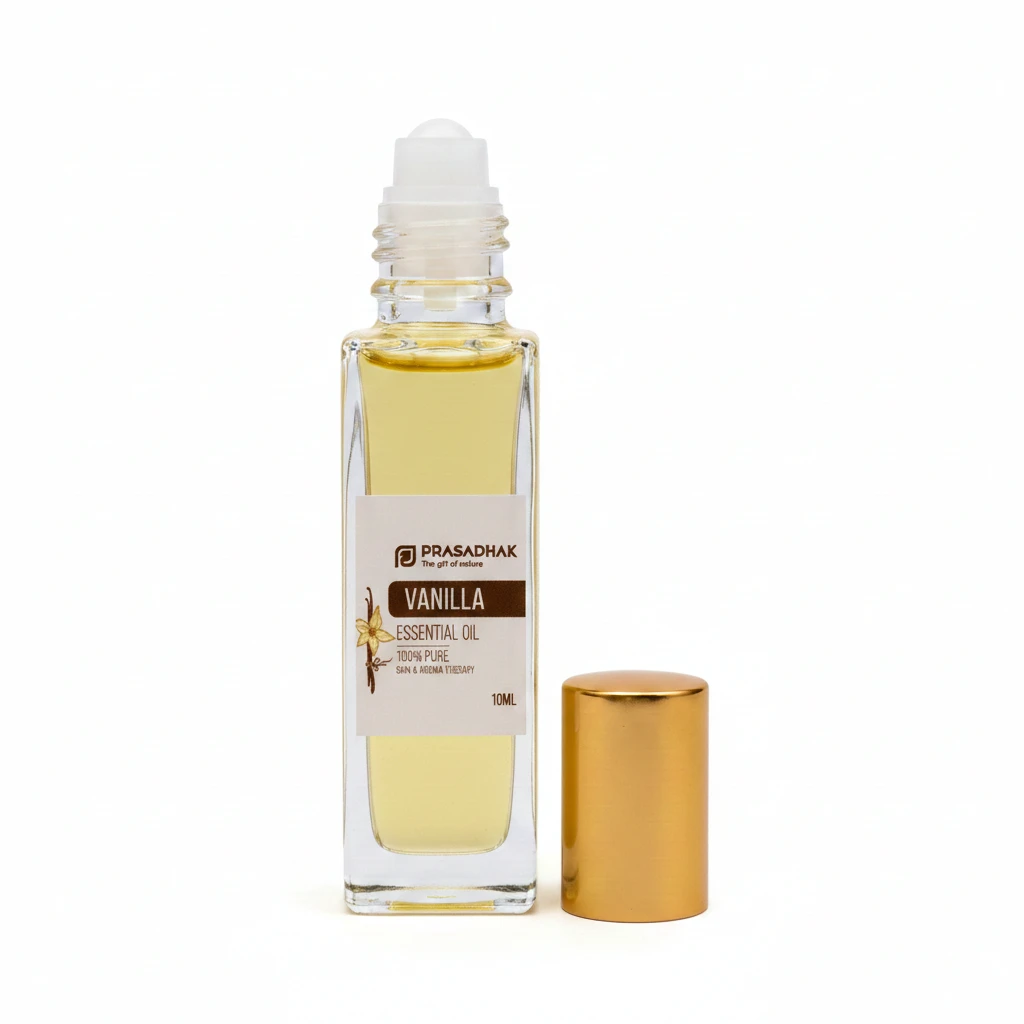 Clear glass roll-on bottle with white roller top, pale yellow vanilla essential oil; gold cap placed beside.
